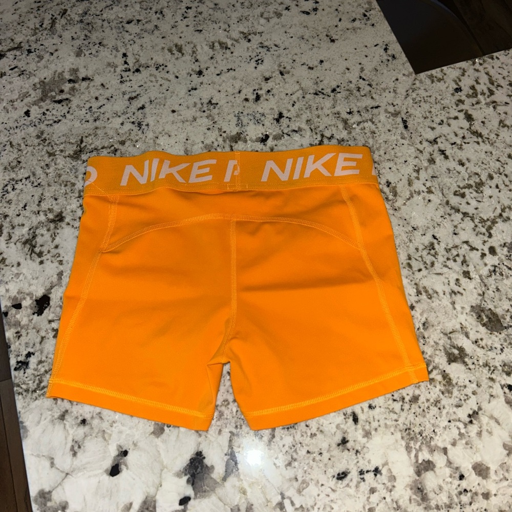 Nike Women's Bright Orange Athletic Shorts - Picture 3 of 3